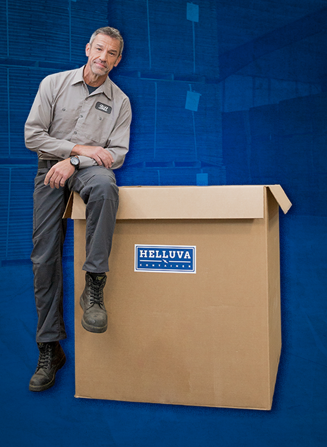 Man leaning against a Helluva Gaylord Box